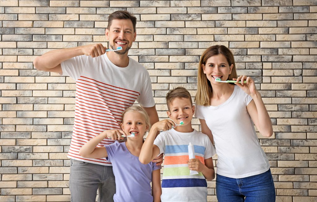 Family Brushing Teeth - Centre Street Dental Espanola